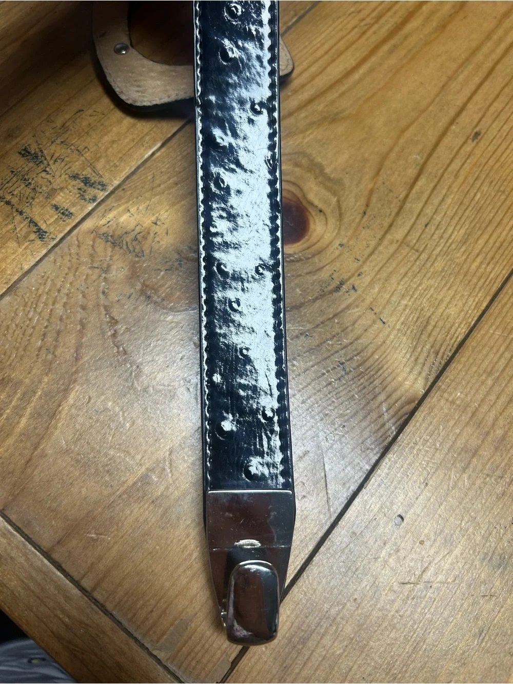 Rolfs Embossed patent leather belt. Size small adjustable versatile styling